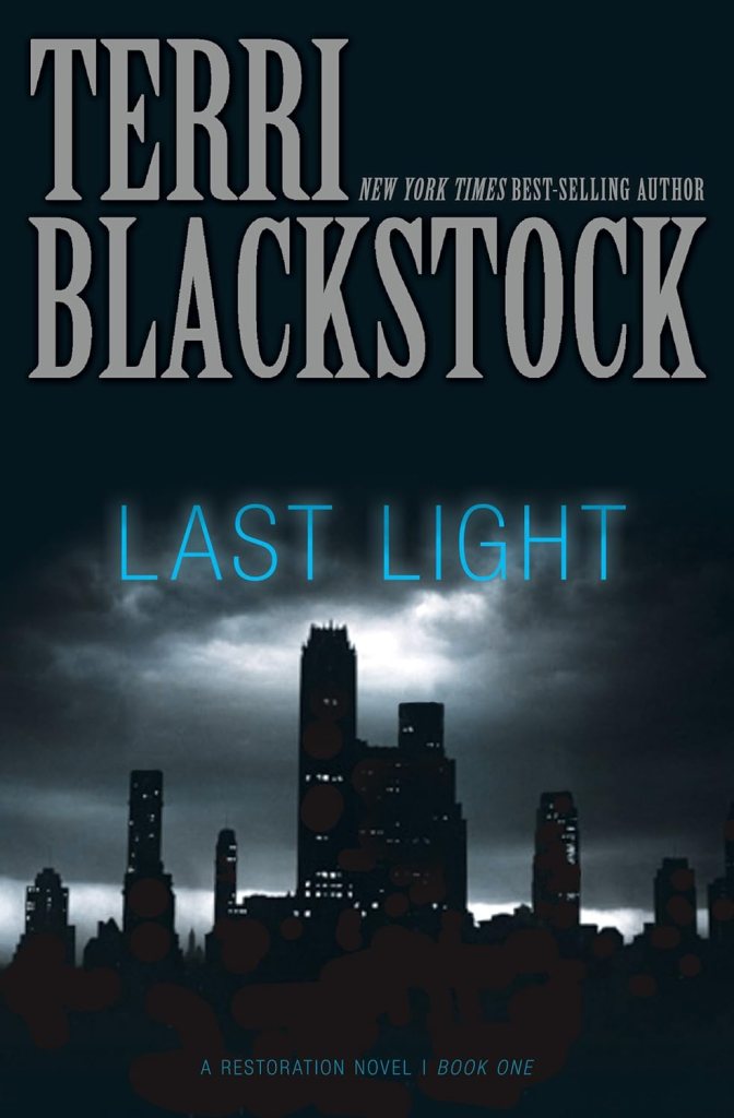 Book cover for Last Light by Terri Blackstock shows a city skyline in silhouette against a night time, cloudy sky